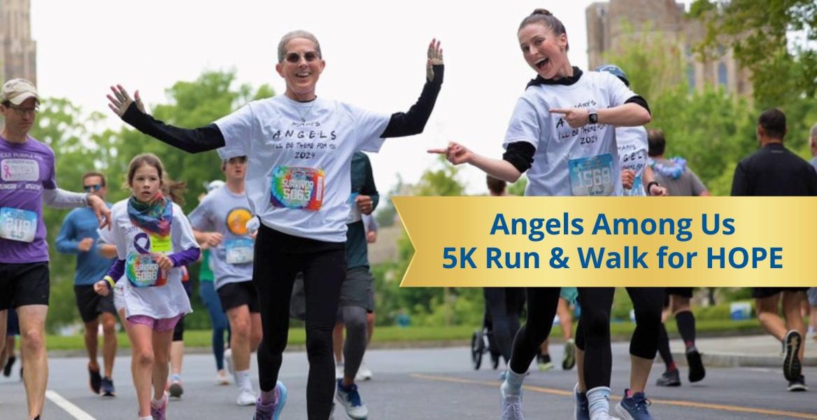 Adults and children enjoying a charity 5K run and walk fundraiser on Duke Unviersity's campus